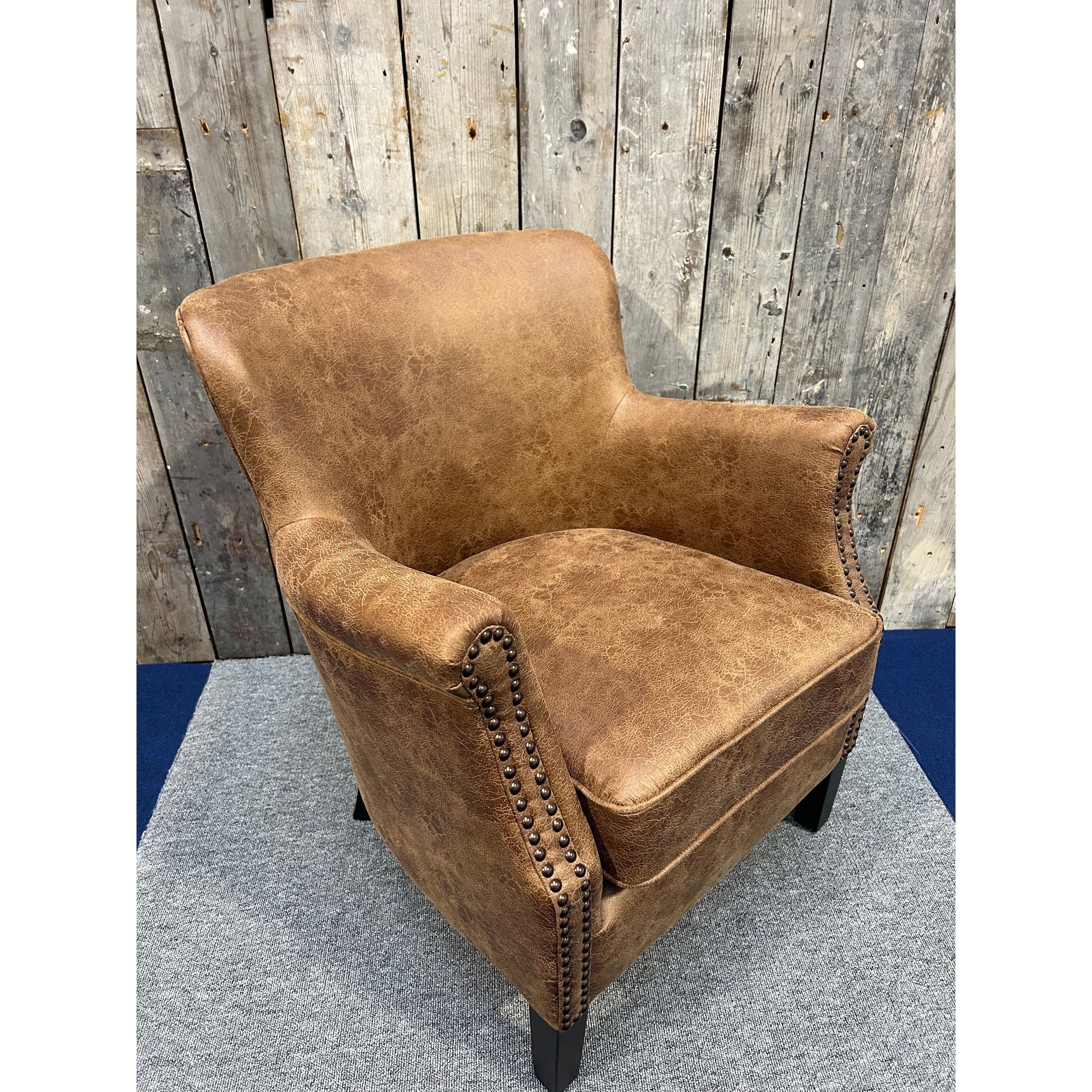Havenheim Furniture Cromarty armchair in vegan vintage leather with plush cushioning and wooden legs, stylish and comfortable for living room.