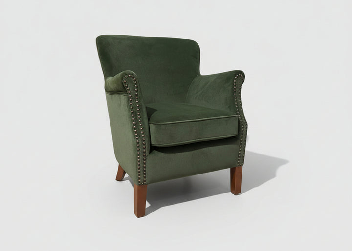 Forest green velvet Cromarty armchair by Ancient Mariner, a stylish and comfortable occasional seating furniture piece.