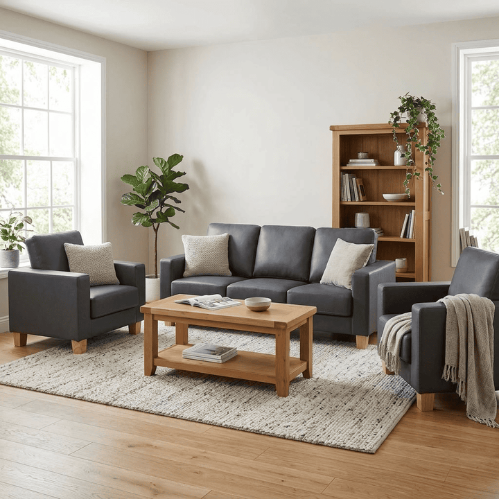 Heartlands Furniture Chesterfield 3 seater sofa in grey PU faux leather in a living room