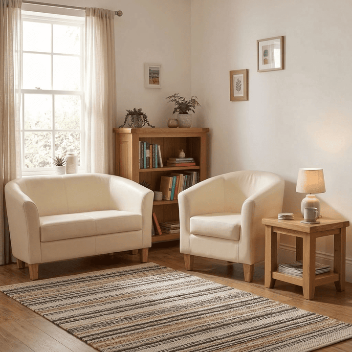 Heartlands Furniture Claridon 2 seater sofa in cream PU faux leather, lifestyle view