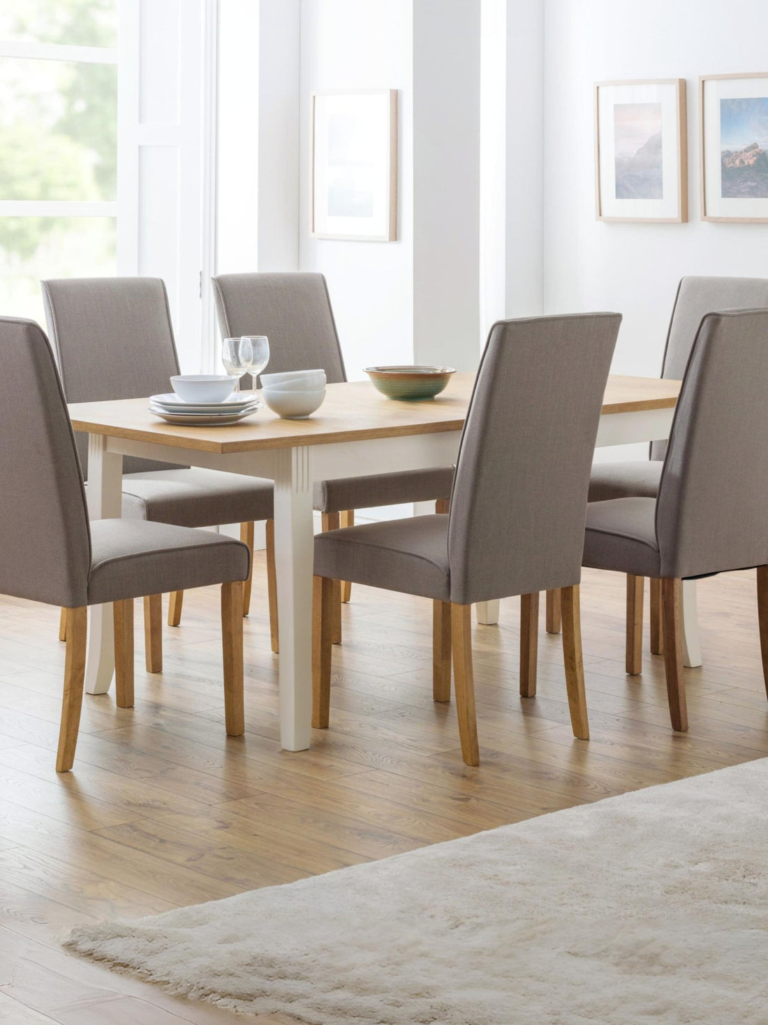 Julian Bowen Davenport extending dining table, 4-6 seater, ivory and oak effect finish in a dining room setup
