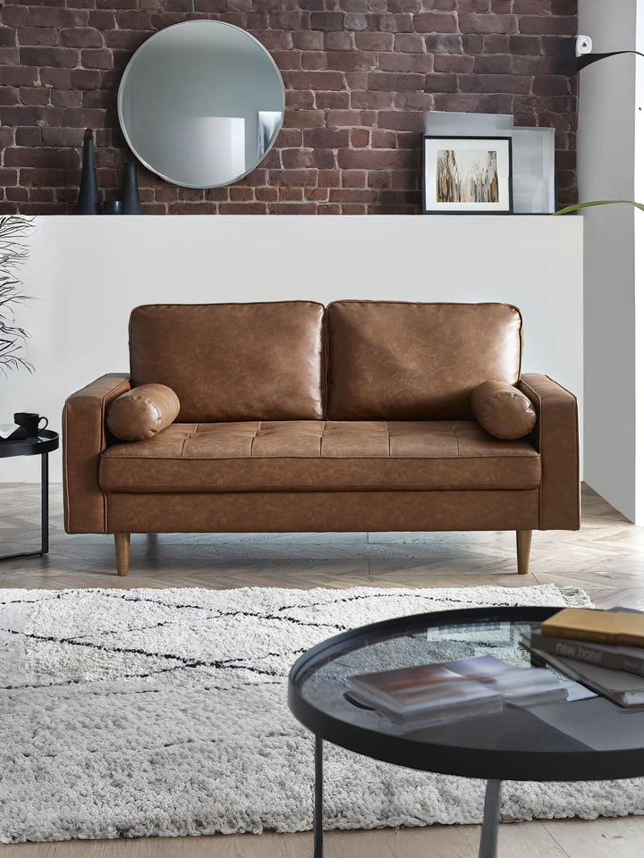 Brown tan faux leather Henley 3-seater sofa with bolster cushions, stylish and comfortable furniture by Julian Bowen.