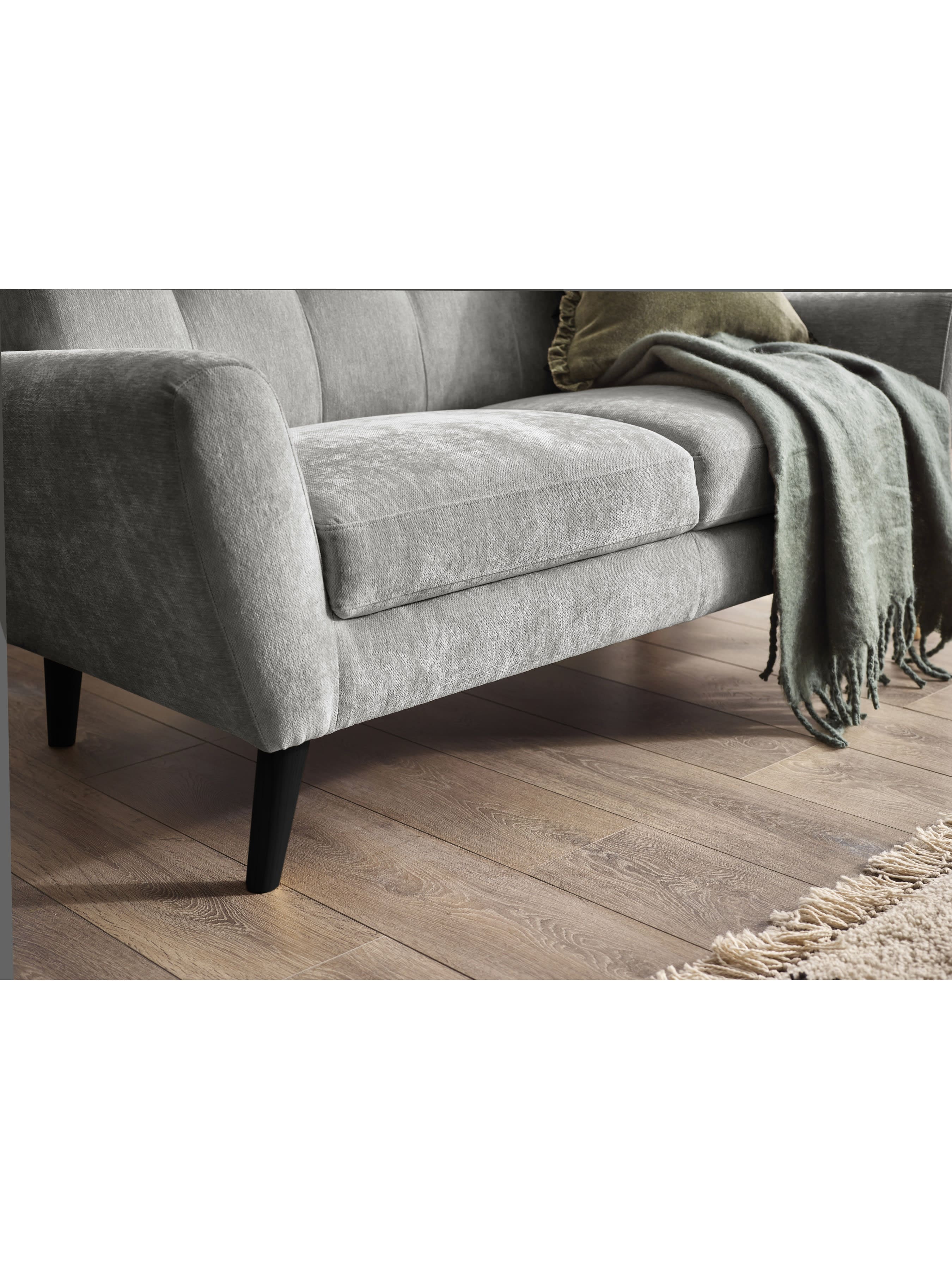 Close-up of Julian Bowen Monza 2-seater sofa in dove grey chenille fabric with wooden legs.